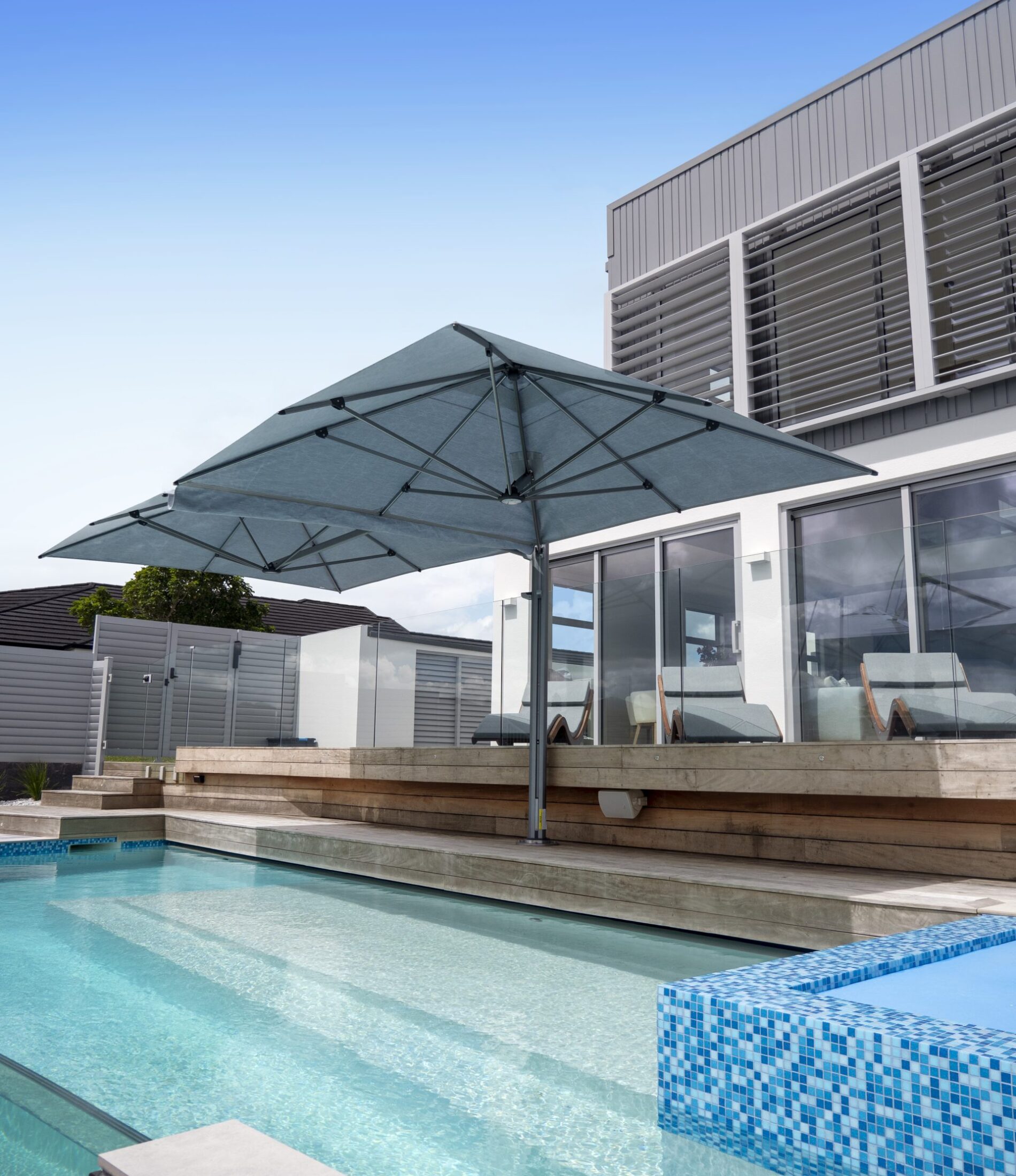 Pool-side-Umbrellas-Sunrise-Blinds